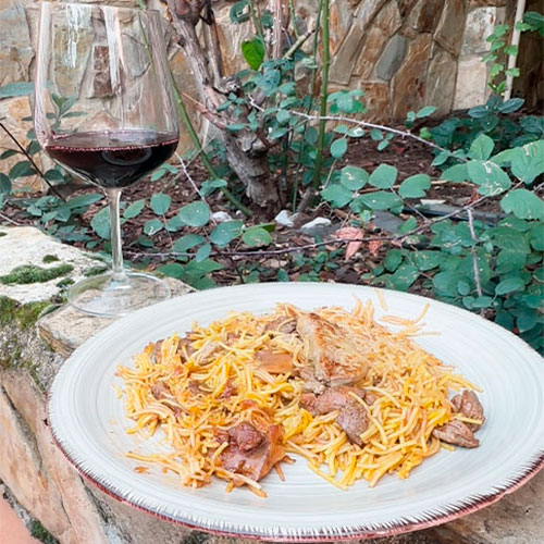 Fideuá con maiale iberico, finferli e foie gras