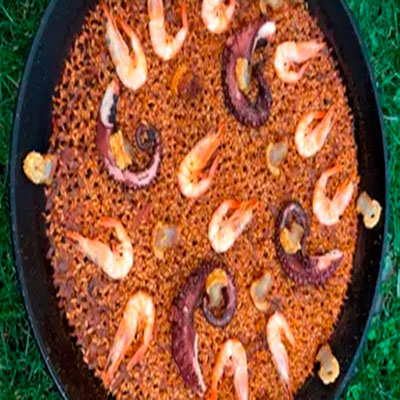 Ricetta di @cherenayuso: Paella con polpo, gamberi e torreznos (pancetta)