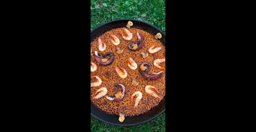 Ricetta di @cherenayuso: Paella con polpo, gamberi e torreznos (pancetta)