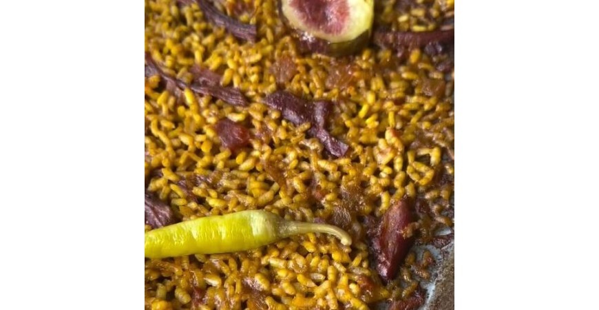Receta de @fanaticook: Paella de pato confitado, higos caramelizados y piparras