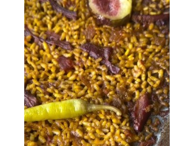 Receta de @fanaticook: Paella de pato confitado, higos caramelizados y piparras